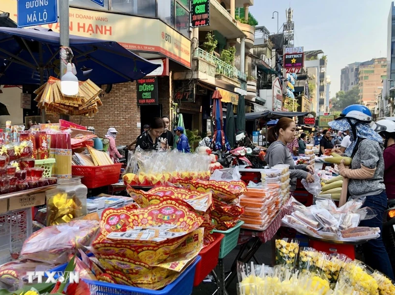 Thành phố Hồ Chí Minh: Sức mua chợ truyền thống tăng nhẹ ngày vía Thần Tài - Ảnh 1