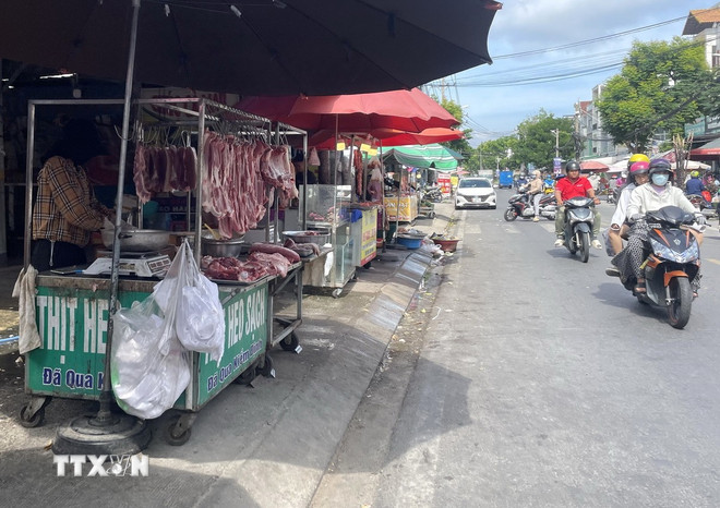 ttxvn-1108-thit-lon-tp-hcm-2.jpg