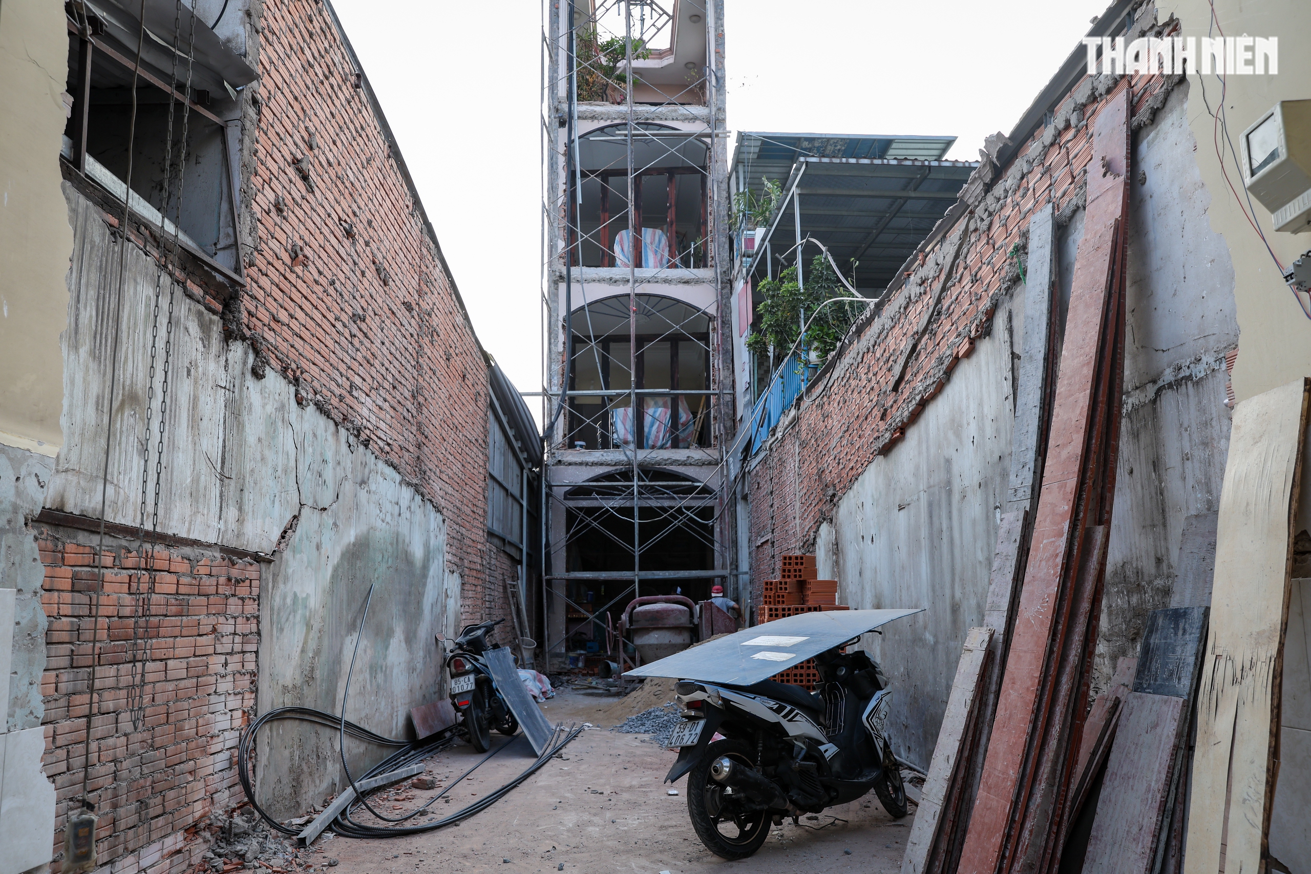 Người dân TP.HCM dỡ nhà, nhường đất mở rộng quốc lộ 13 sau nhiều lần chậm trễ - Ảnh 12.