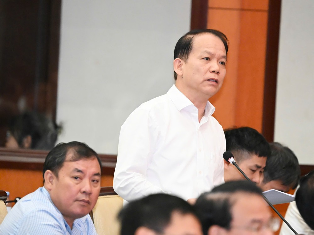 Bộ trưởng Bộ Tư pháp Hoàng Thanh Tùng phát biểu. Ảnh: VIỆT DŨNG z7931260746913_4383eb75e8f9780180fb9a6a0b45fc72.jpg