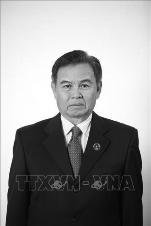 Đồng chí Saysomphone Phomvihane, Ủy viên Bộ Chính trị Trung ương Đảng, Chủ tịch Quốc hội nước Cộng hòa Dân chủ Nhân dân Lào. Ảnh: TTXVN quoc tang.jpg